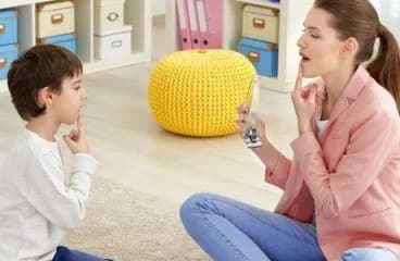 A speech session between a therapist and a child